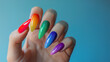 © Pajaros Volando - Close up image of nail art for pride month concept. LGBT community and nail art concept