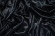 Elegant top view of rich black satin folds, ideal for premium branding and luxe designs.