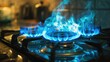 Blue flames dance on gas stove