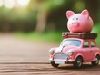 Piggy bank on the roof of a car on a wooden background. Saving money concept