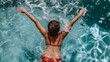 © Diffin - girl swims in the pool