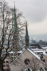 Wall Mural - Snow covered church tower in Zurich, Switzerland