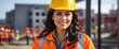 Female hispanic mexican engineer architect on construction site smiling looking at the camera, copy space banner template backdrop from Generative AI