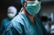 closeup shot of a surgeon wearing scrubs in a hospital