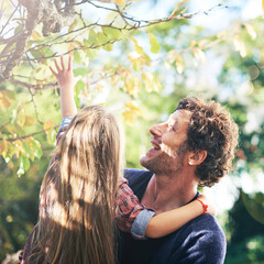 Sticker - Father, daughter and smile in garden in autumn with trees, leaves and curious for ecosystem and environment. Family, man or girl child with excitement in backyard of home for bonding, nature or relax