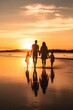cropped shot of a beautiful family walking along the beach at sunset