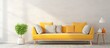 A yellow sofa with cushions and a potted plant in a white room
