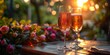 A romantic evening with a pair of wine glasses, champagne, and a sunset backdrop.