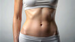 © Uncle-Ice - Slim woman , showcasing fitness and healthy lifestyle, with focus on her toned abdomen and waist