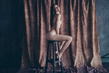 Fototapeta Panele - No filter photo of happy stunning lady sitting stool posing for photo shooting isolated studio background