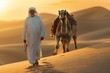 an elderly arab man wearing a white thobe while wearing a kerchief walking with a camel in sahara desert  during sunshine in the morning