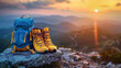 Yellow hiking shoes and a blue hiking backpack rest atop a high hill or rock, silhouetted against the setting sun, capturing the essence of adventure and exploration.