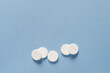 © Olena Svechkova - tablets on a blue background, health and medicine