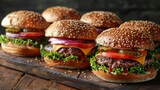 Fototapeta  - Delicious gourmet hamburgers with diverse cheeses and fresh vegetables