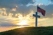 White cross on a hill with USA flag, sunset in the background, memorial day.