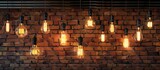 Fototapeta  - An art installation featuring a bunch of light bulbs hanging from a brick wall, illuminating the darkness with a warm glow, creating a unique event in a rustic building