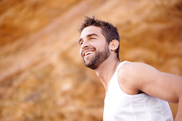 Canvas Print - Man, runner and happy for outdoor workout, sports and nature for cardio or training for marathon. Male person, action and fitness on mountain for performance challenge, athlete and exercise for race