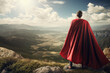 Businessman superhero with red cape standing and looking on the top of mountain landscape generative ai