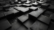 A dark image creating a striking abstract pattern with elevated black square tiles and light effects