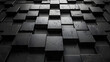 An artistic arrangement of cubes with a 3D black textured surface gives a sense of structure and order