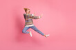 Full length photo of dangerous girl dressed print sweater fly look empty space at fight club logo isolated on pink color background
