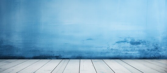 Wall Mural - An interior setting featuring a blue wall contrasting with a wooden and white floor