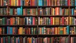 © Matthew - An extensive collection of vibrant, colorful books arranged neatly on wooden shelves, showcasing a variety of sizes and bindings