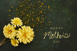 Happy Mothers day greeting background with yellow zinnia flowers.