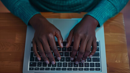 Sticker - Close-up of hands typing on a backlit laptop keyboard in a dimly lit setting.