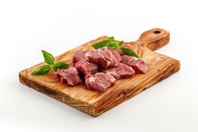 Raw Lamb Meat Lies On A Wooden Board Isolated On White Background