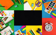 © Liudmyla - Collage of school stationery on the colored background. Top view. Copy space.