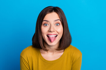 Poster - Photo of funky tricky lady dressed shirt stick out smiling empty space isolated blue color background