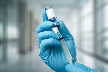 Poster - doctor's hand with medicine bottle for vaccine