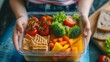 Healthy Snack Preparation with Fresh Vegetables in a Plastic Container