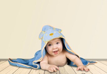 Poster - Adorable happy infant baby on floor