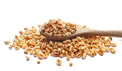 Wall Mural - Puffed wheat cereal flakes with honey in wooden spoon isolated on white, side view
