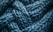 © Alexey - Close-up of textured knitted fabric in neutral and warm tones. Comfort and clothing concept