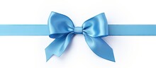 Close-up Of A Blue Ribbon With Tied Bow