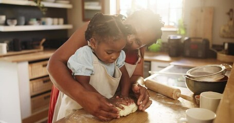 Canvas Print - African, mom and baking with kid in kitchen and learning together in home and press dough on table in morning. Mother, teaching and child helping with cooking or prepare bread, mixture and breakfast