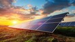 © Viktoriia Kan - Large field of photovoltaic solar panels under a blue sky with beautiful clouds at sunset and mountains in the background. The sun sets behind the solar panels, casting long shadows.