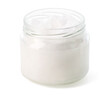Open jar of coconut oil on white background