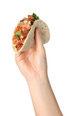 Woman holding delicious taco with meat and parsley on white background, closeup