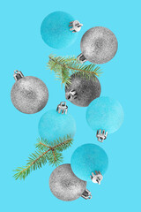 Sticker - Different Christmas balls and fir tree branches falling on light blue background