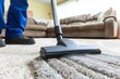 Professional carpet cleaning service using advanced vacuum cleaner