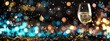 Banner with glass of champagne on dark background with blue and gold lights bokeh, glitter and sparks. Christmas celebration concept with space for text