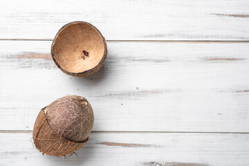 Two coconuts are on a white background