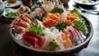 A selection of raw fish slices served on a platter.