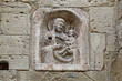 Madonna con Bambino; bassorilievo all'esterno della Basilica di San Michele a Pavia