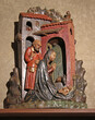 Natività di Cristo; altorilievo in legno dipinto del XV secolo nella Basilica di San Michele a Pavia