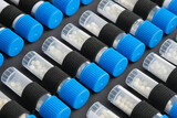 Fototapeta Lawenda - Tubes of homeopathic globules with different homeopathic preparation. Homeopathy first aid kit close up.